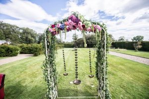 bright-floral-arch-belsflowers-Sean-Elliott-photography