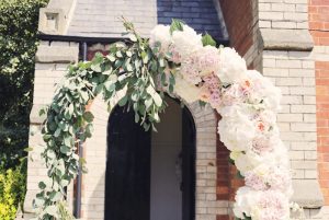 peach-eucalyptus-hydrangea-flower-arch-belsflowers-helen-russell-photography